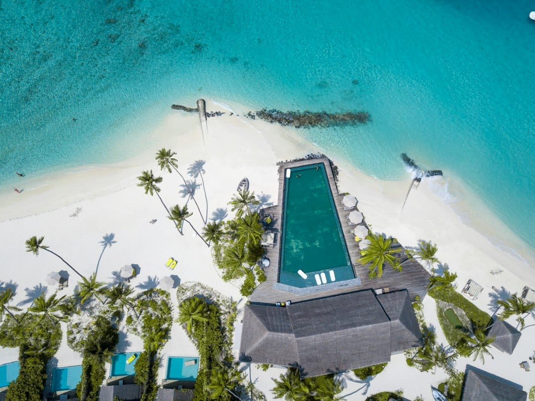 Aerial view of Seabreeze beachfront villa with private pool and ocean access