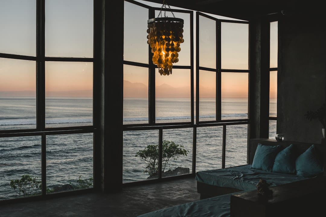 Luxury tropical villa bedroom with ocean view
